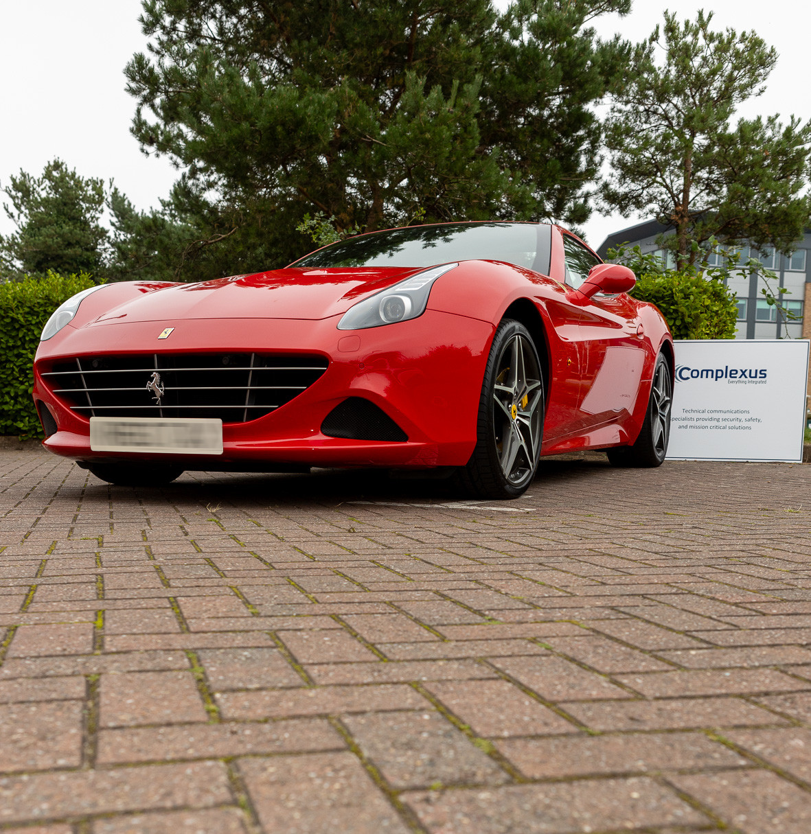 Front of a Complexus clients Ferrari with tracking device and immobiliser installed