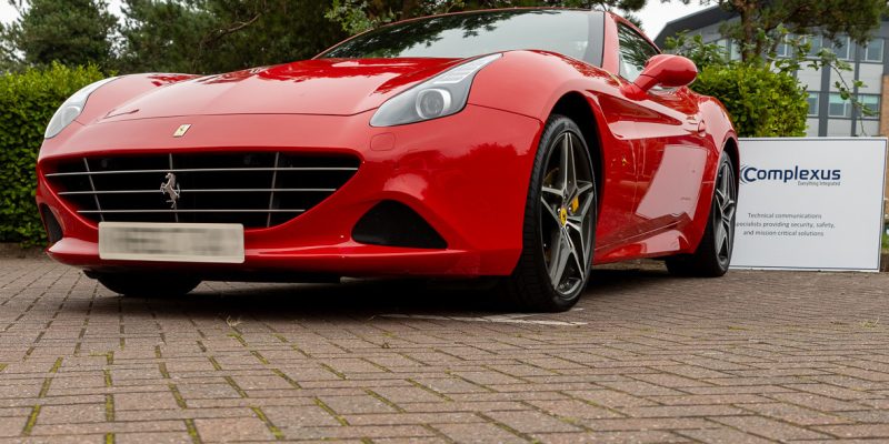 Front of a Complexus clients Ferrari with tracking device and immobiliser installed